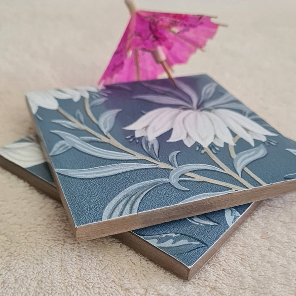 Elegant white flowers on blue background, handmade coasters using a John Lewis floral wallpaper, by Shel's Shabby Chic, Stotfold.