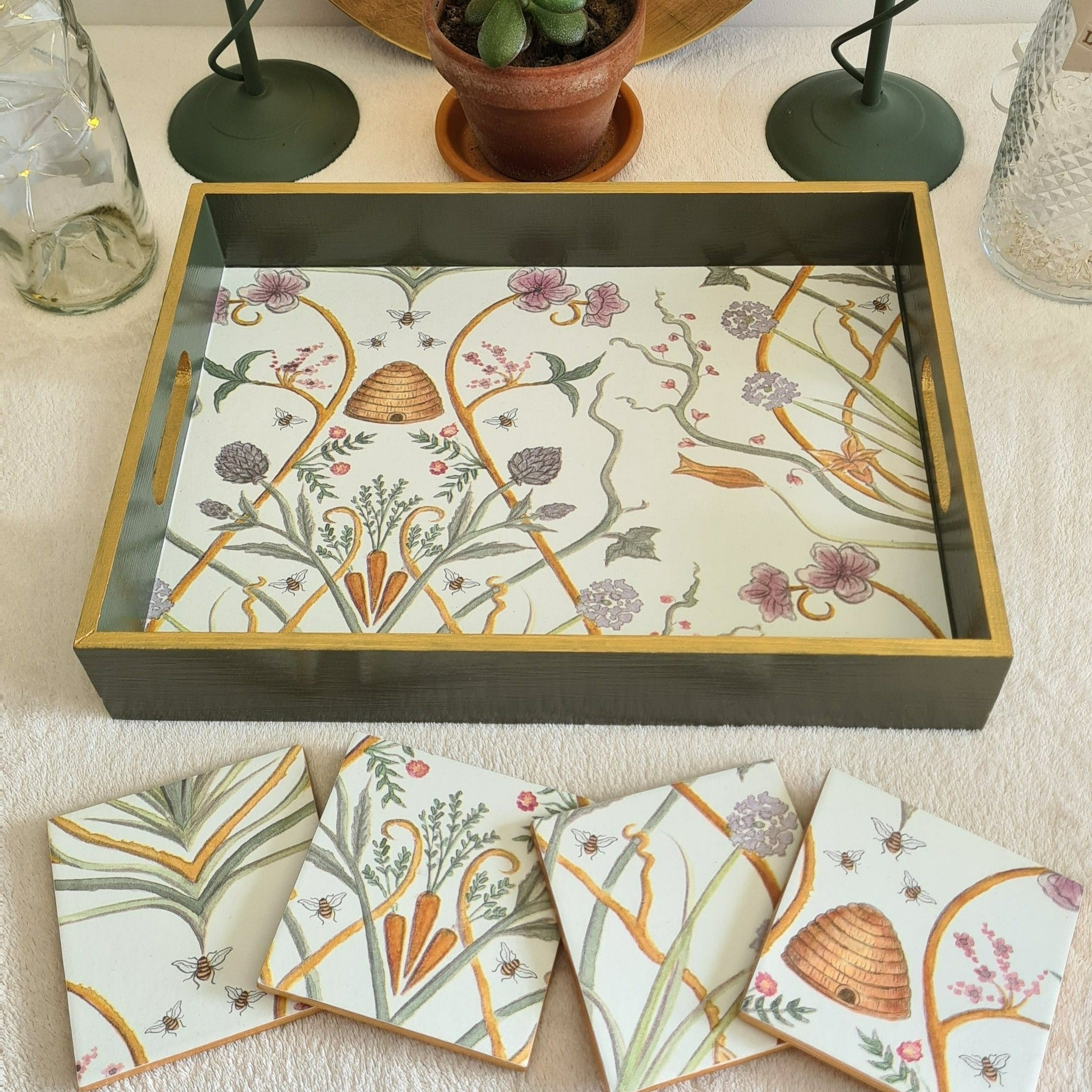 Beautifully decoupaged serving tray.  Painted deep green with gold edging, decoupaged in Angel Strawbridge's Potagerie wallpaper from her Escape To The Chateau range.  Handmade by Shel's Shabby Chic in Stotfold.