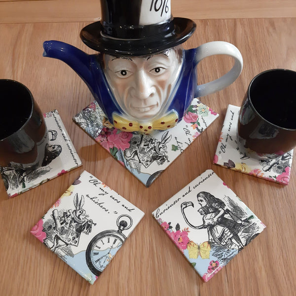 Alice in Wonderland handmade coasters and bottle stand styled together with a Mad Hatter teapot as totally unique tableware.