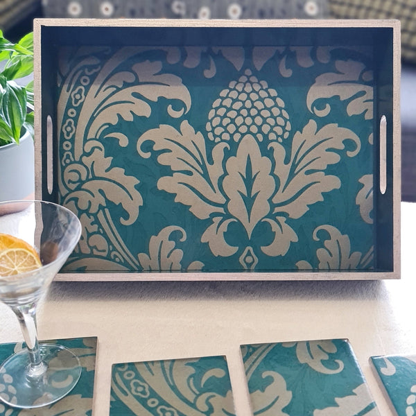 intricate Baroque-inspired design and metallic Champagne detailing on a handcrafted wooden serving tray.