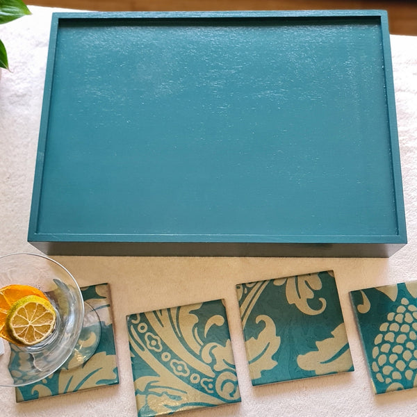 Reverse of handcrafted teal Baroque wooden serving tray with integrated handles and metallic Champagne detailing.