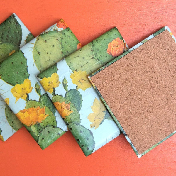 Reverse of handmade ceramic coaster featuring a vibrant colourful cactus design, cork backed.