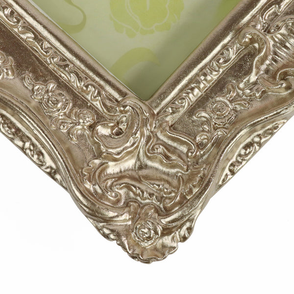 Guild Lane GILD Champagne metallic paint used to highlight decorative detail on a frame.
