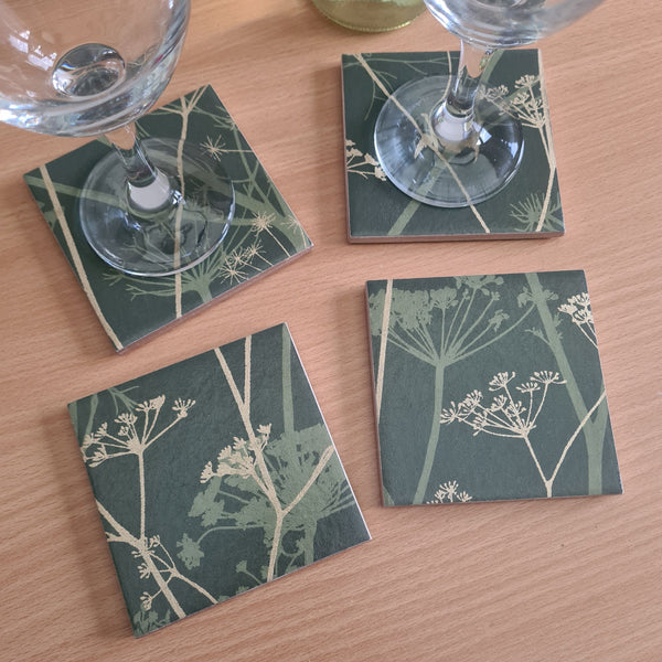 Limited-edition set of four ceramic coasters handmade using Clarissa Hulse Wild Chervil wallpaper in Sage and Gold.