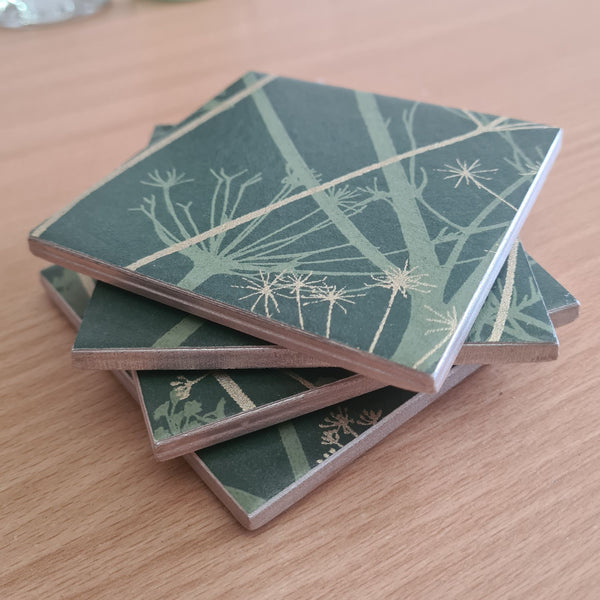 stacked set showing handcrafted finish on a Wild Chervil ceramic coaster in Sage and Gold.