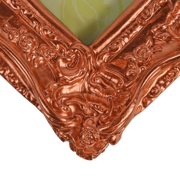 Guild Lane GILD Copper metallic paint used to highlight decorative detail on a frame.