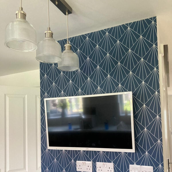 Customer's geometric Art Deco style wallpaper used to create matching placemats and coasters by The Furniture Bureau.