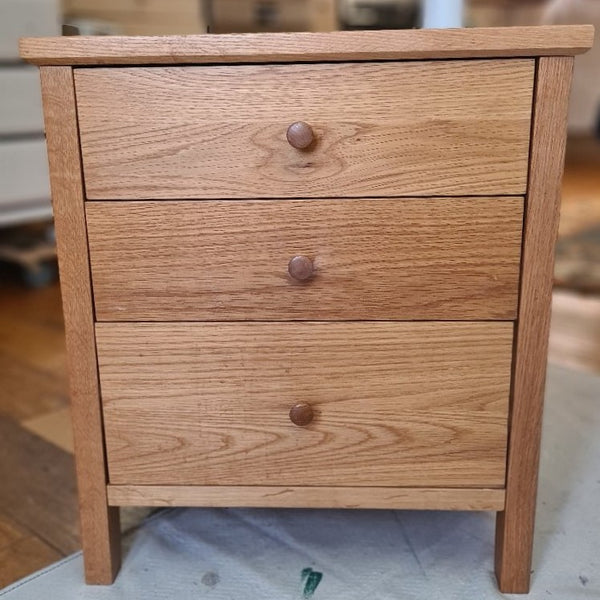 Wooden furniture, a small three drawer chest, before a 1-to-1 furniture painting workshop in Stotfold.