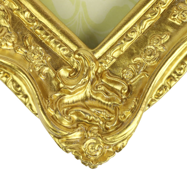 Guild Lane Super GILD Gold used to highlight carved furniture and architectural moulding details.