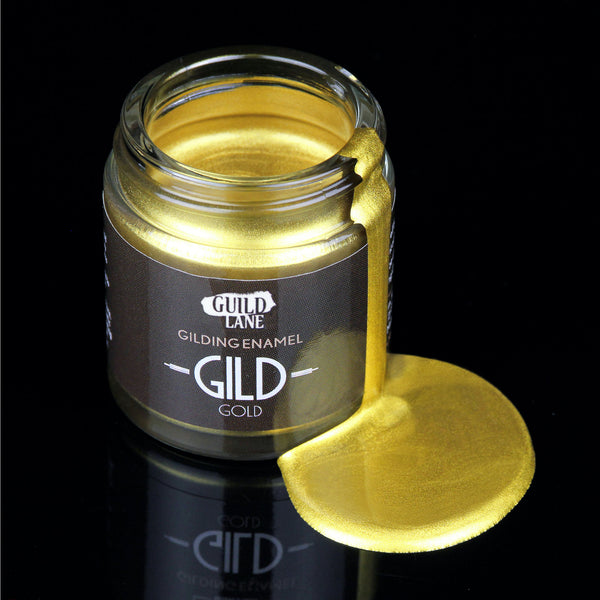 Open jar of Guild Lane Super GILD Gold premium metallic gilding paint for interior and exterior projects.