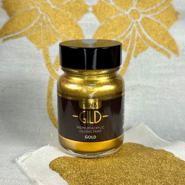 Jar of Guild Lane Super GILD Gold showing its highly pigmented reflective metallic finish on fabric.