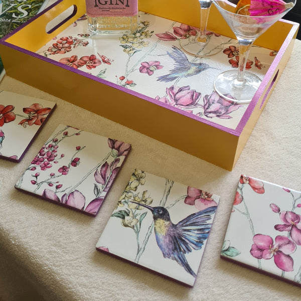 Matching hummingbird floral ceramic coasters with metallic violet edging.  Available separately.