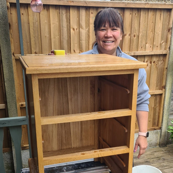 Wonderful smiley beginner, cleaning her wooden furniture at a 1-to-1 Workshop in Stotfold.