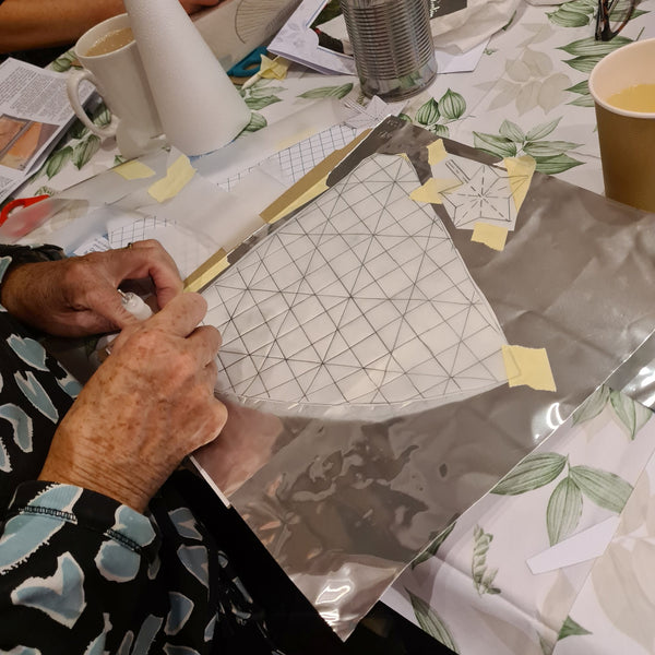 Metal embossing kit being used by a beginner.