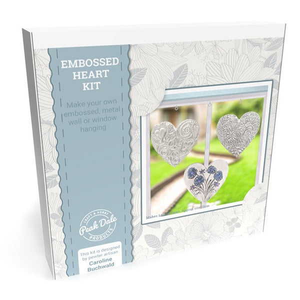 Boxed kit of handmade silver embossed hanging heart personalised with decorative details and hidden words.