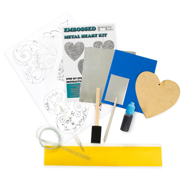 Silver Hanging Heart metal embossing kit contents with MDF heart, aluminium, tools, ribbon, templates and full instructions.
