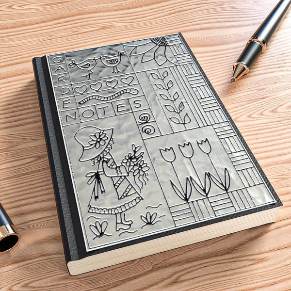 A black A6 journal with metal embossed cover, personalised notebook.