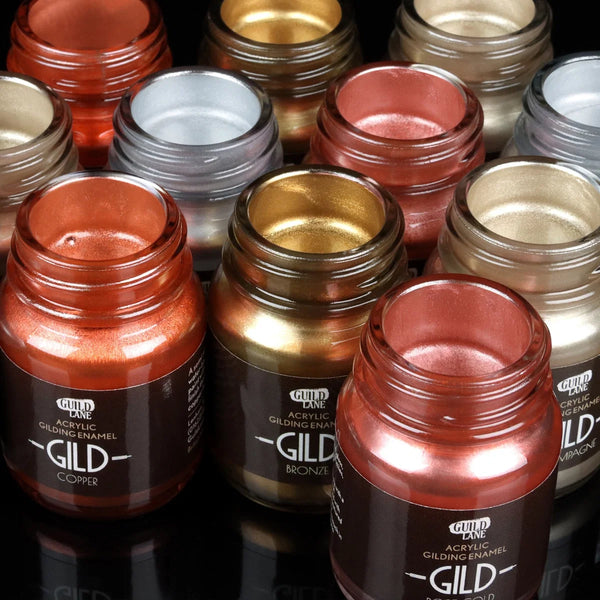 Open jars of Guild Lane Original GILD metallic paint in Silver, Bronze, Champagne, Copper and Rose Gold.