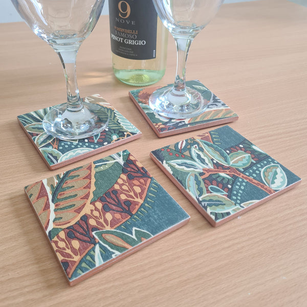 Nature's Exhibitionists handmade ceramic coasters styled as colourful maximalist coffee table accessories.