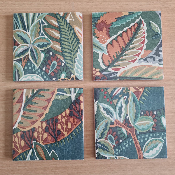 One-of-a-kind set of four ceramic coasters handmade using Nature's Exhibitionists wallpaper.