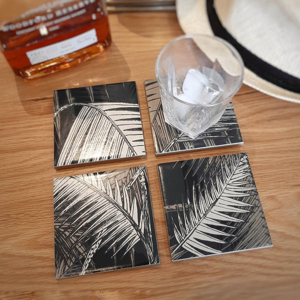 Palm Jungle ceramic coasters styled as unique tropical botanical home accessories.