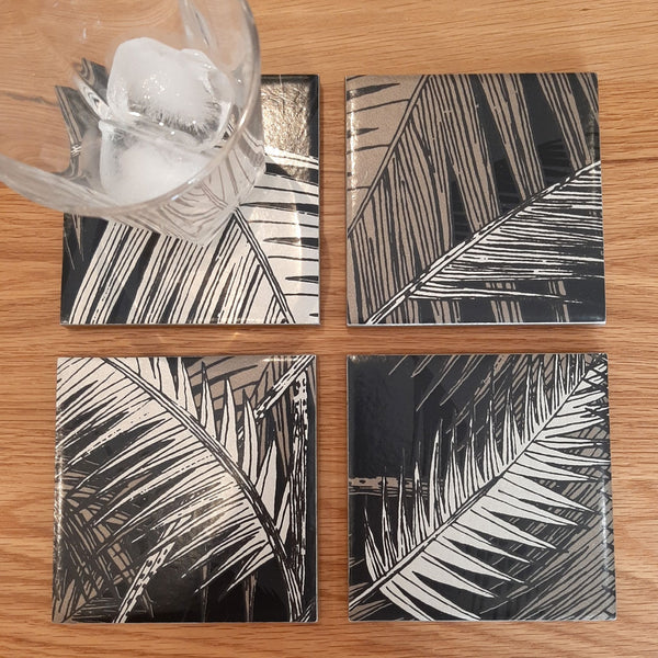 One-of-a-kind set of four ceramic coasters handmade using Cole & Son Palm Jungle wallpaper.