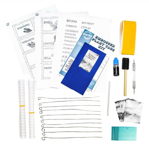 Contents of plant Labels metal embossing kit with aluminium pieces, hanging spikes, tools, templates and instructions.