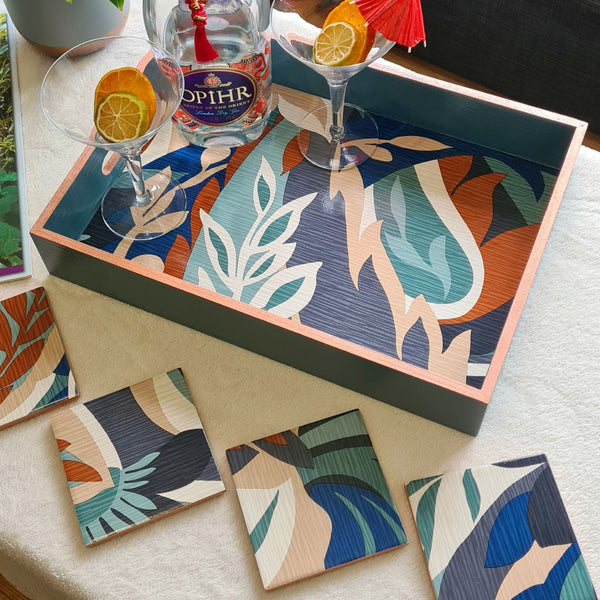 Limited-edition set of four handmade Retro Leaf ceramic coasters in teal, burnt orange, blue, beige and cream with matching serving tray, available separately.