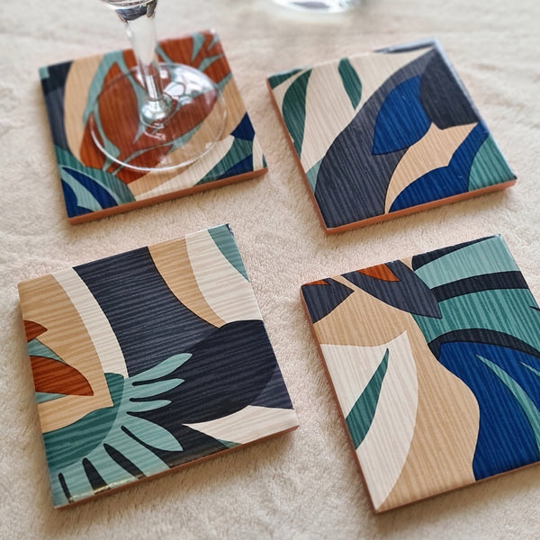 Handcrafted teal Retro Leaf wooden serving tray with matching ceramic coasters and metallic copper edging.