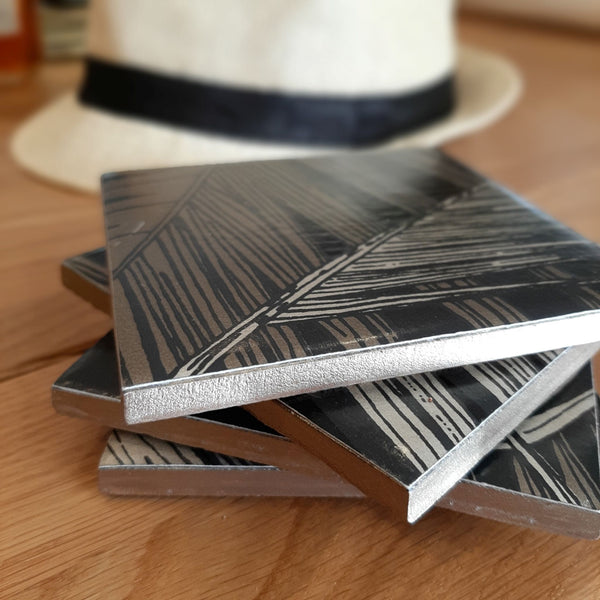 Guild Lane GILD Silver metallic paint used to add silver detailing to handcrafted ceramic coasters.