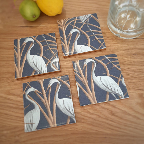 Set of four handmade The Chateau Nouveau Heron ceramic coasters featuring Angel Strawbridge’s heron design.