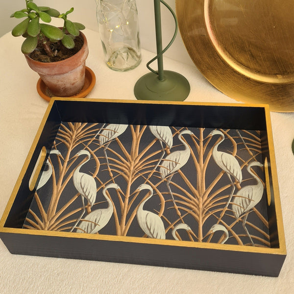 Nouveau Heron serving tray, featuring navy blue paint and metallic bronze edging.