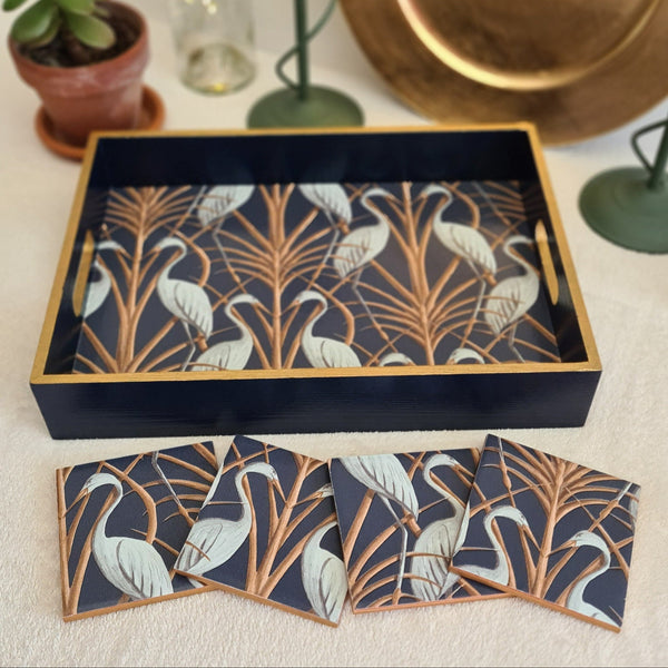 Navy wooden serving tray decorated with Angel Strawbridge Nouveau Heron design and metallic bronze edging, with matching coasters, available separately.
