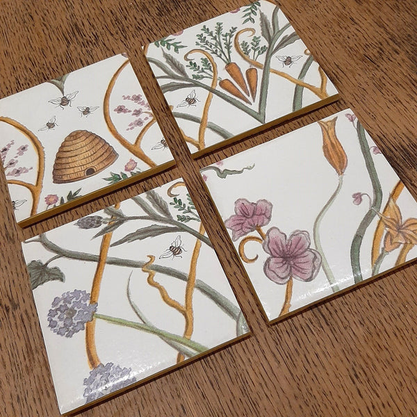 Set of four handmade The Chateau by Angel Strawbridge Potagerie ceramic coasters featuring the unique French garden design.