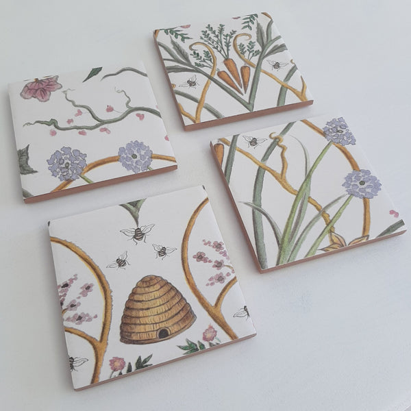 Set of four handmade The Chateau by Angel Strawbridge Potagerie ceramic coasters featuring the French garden design.