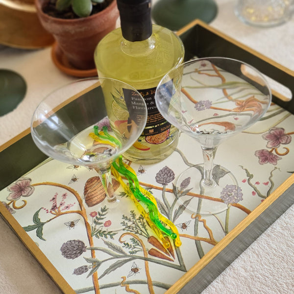 Olive green The Chateau Potagerie serving tray styled with cocktail glasses and coordinating home accessories.