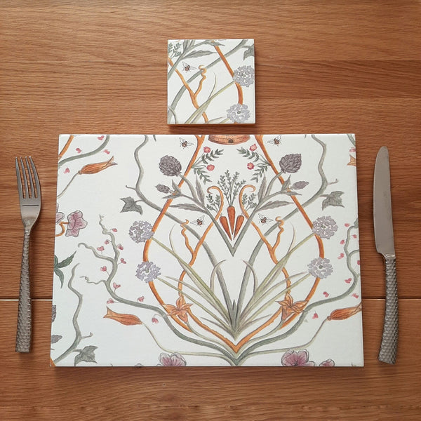 Handmade Chateau Potagerie ceramic placemat with matching coaster for a coordinated table setting.