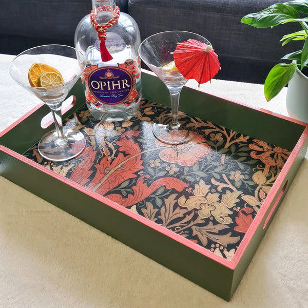 Handcrafted William Morris Compton wooden serving tray in autumnal colours with deep sage green paint and rusty red metallic edging.