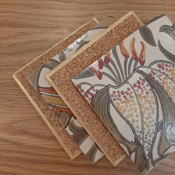 Cork backing and metallic edging on William Morris Golden Lily botanical design in Biscuit on a handmade ceramic coasters.