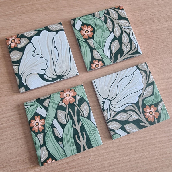Set of four handmade ceramic coasters decoupaged with William Morris Pimpernel botanical design.