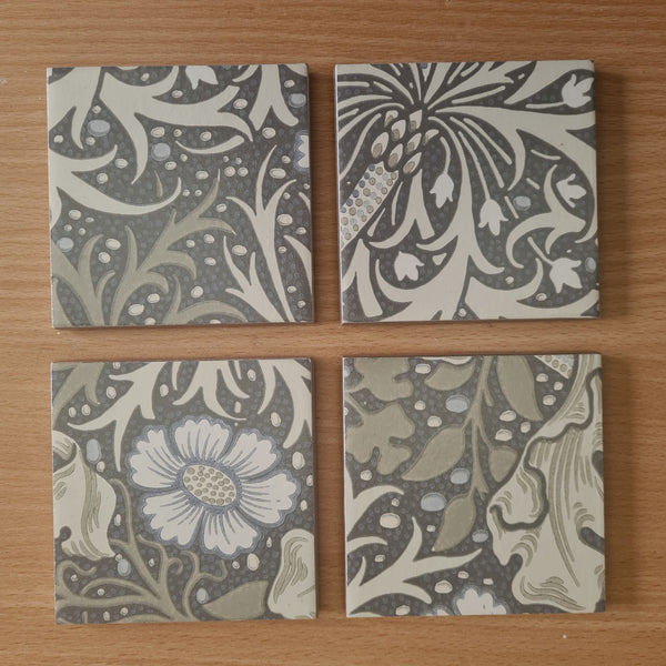 Set of four handmade ceramic coasters decoupaged with William Morris Seaweed Art Nouveau design.