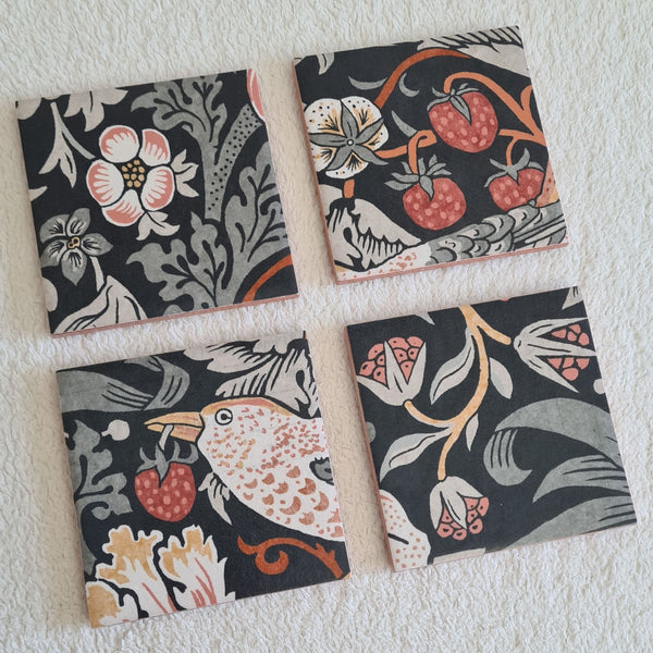 Set of four handmade William Morris Strawberry Thief ceramic coasters in Charcoal Grey.
