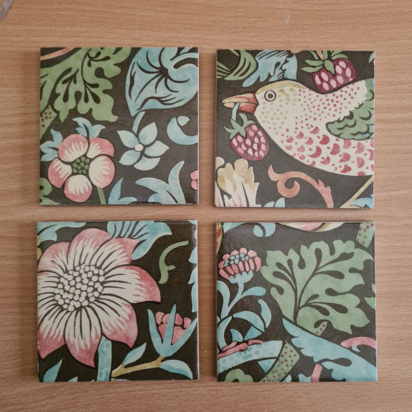 Set of four handmade William Morris Strawberry Thief ceramic coasters in Chocolate Brown.
